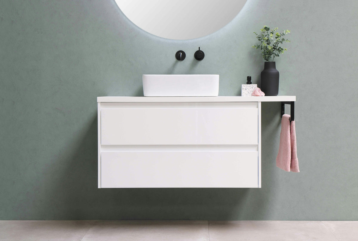 White vanity cabinet with a mirror