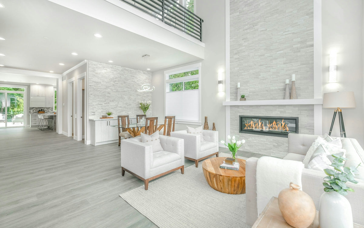 Renovated living room with fireplace and warm finishes