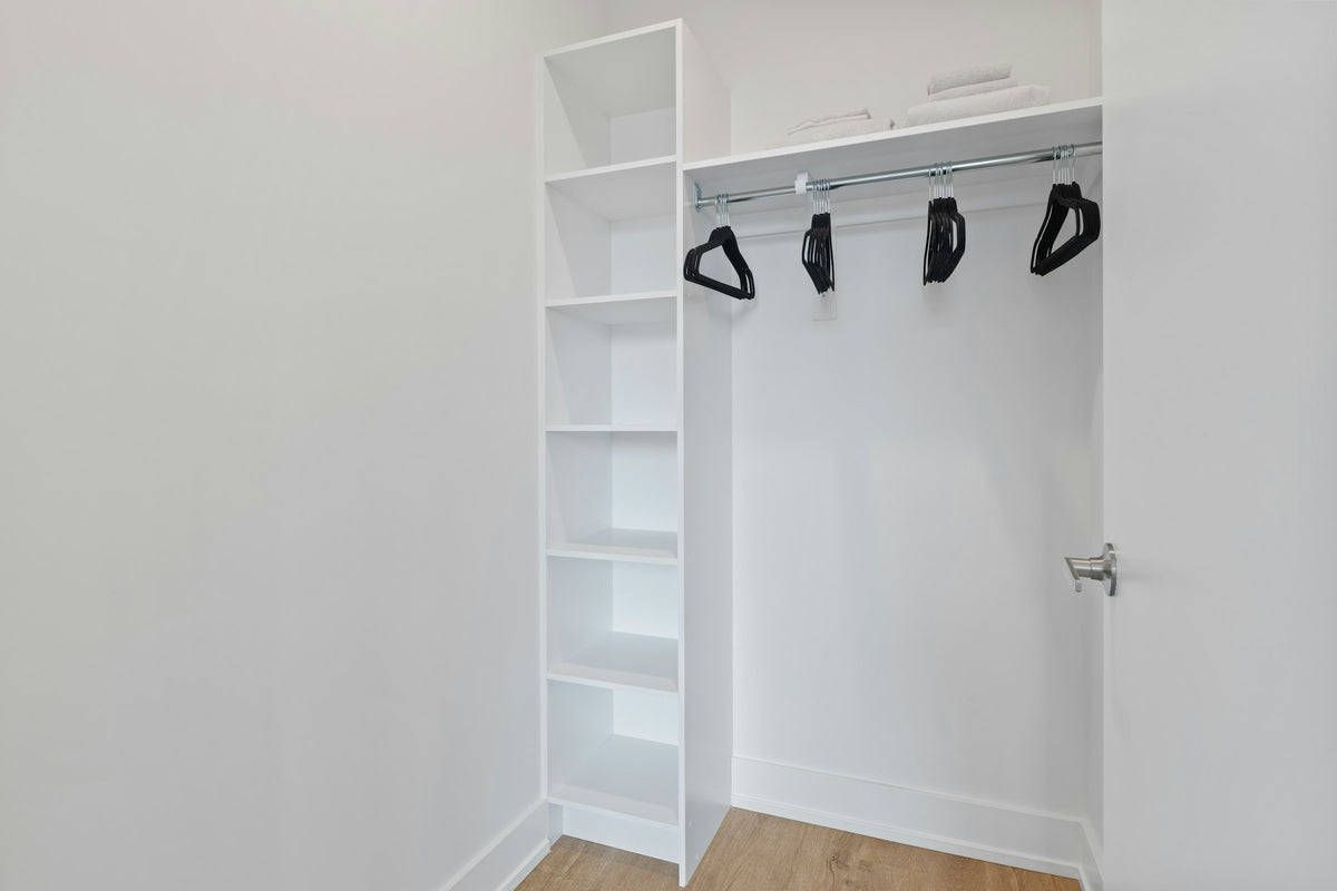 White closet shelving with shoes