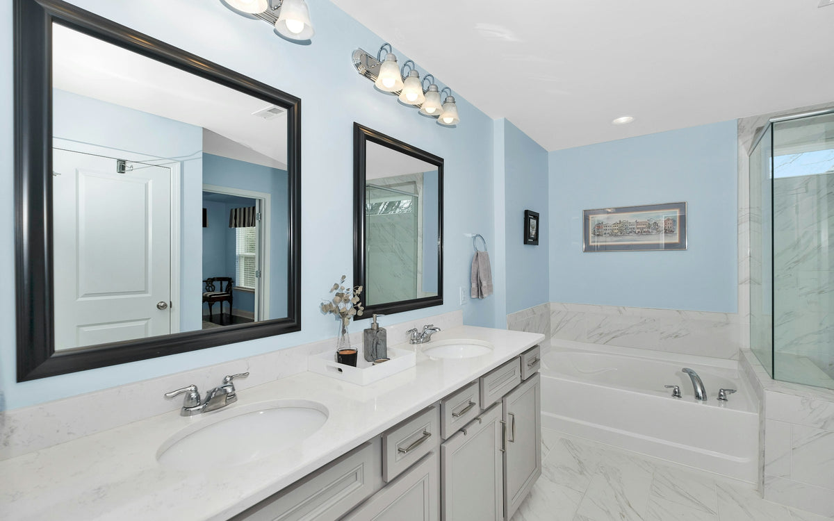 Primary bathroom with a double-sink vanity