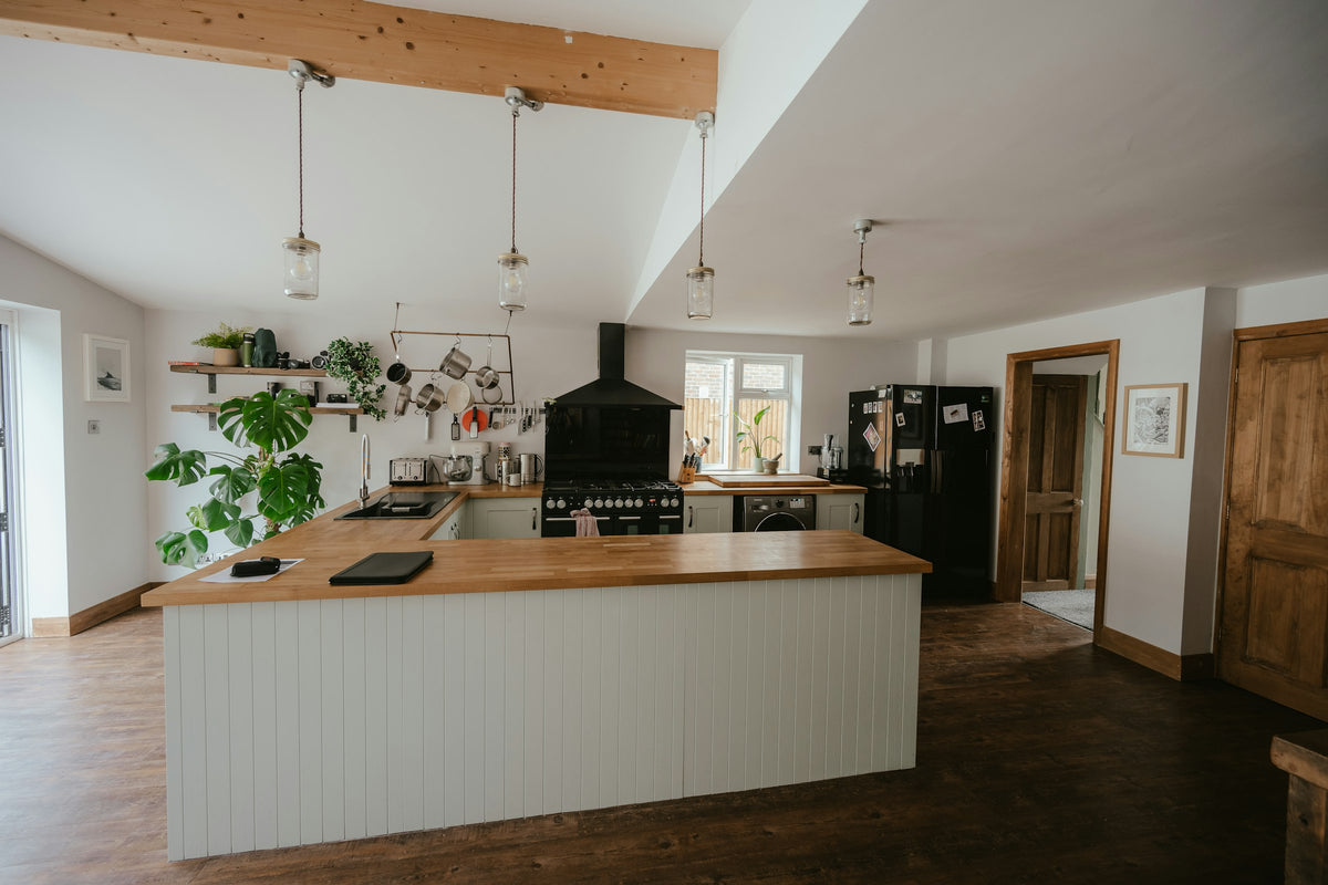 Kitchen with a bar and island