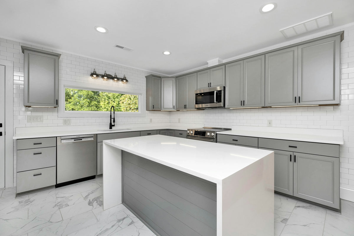 Kitchen with white Shaker-style cabinets