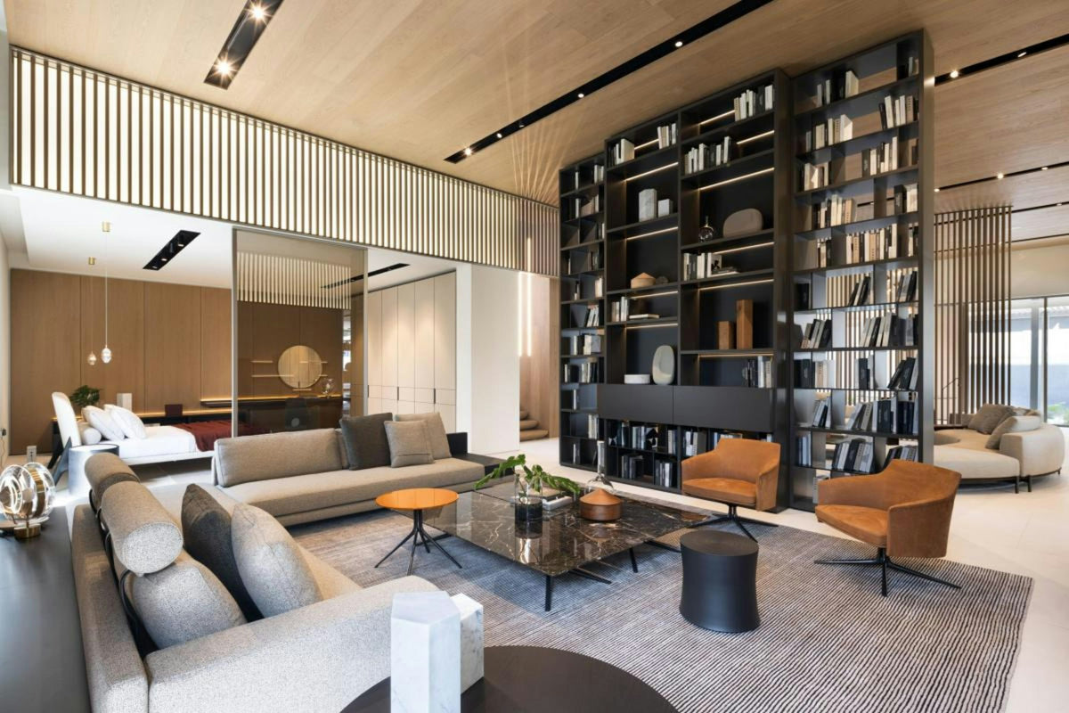 Modern living room with a large built-in bookshelf