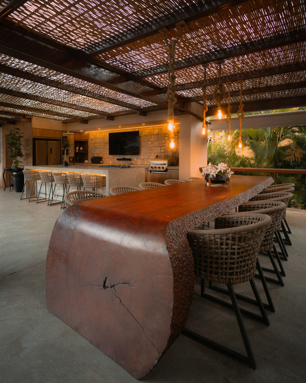 Large wooden table in an outdoor dining area