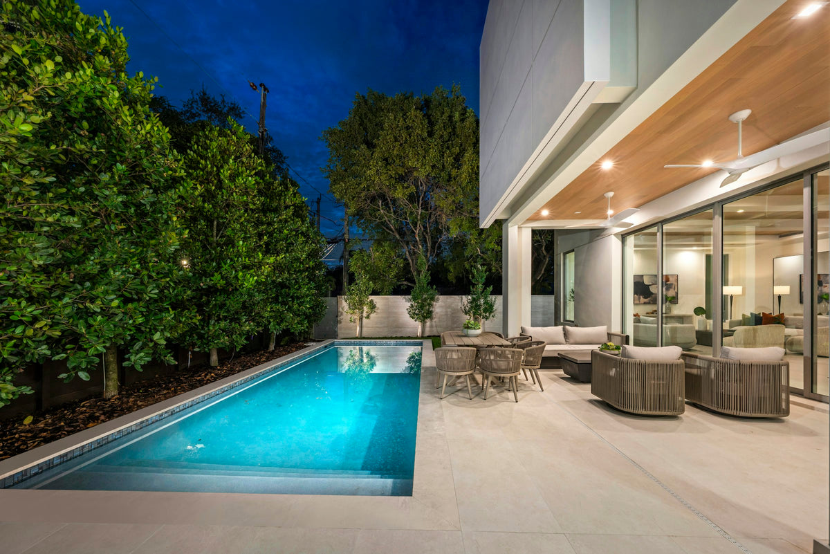 Modern home with a pool and outdoor seating area